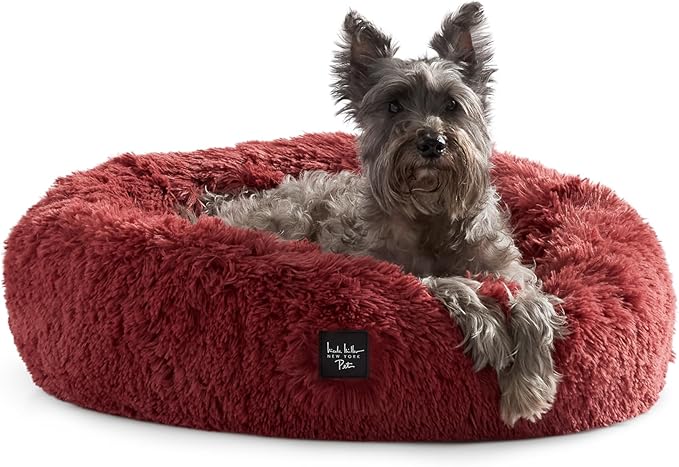Nicole Miller New York PET Ellie Fuzzy Solid Donut Pet Bed, Plush, Cozy & Calming, Non-Slip Bottom, 100% Machine Washable, Burgundy Rose, X-Small 19"x19"x7" Round