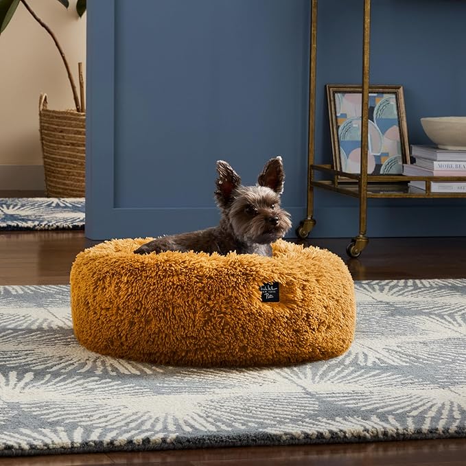 Nicole Miller New York PET Ellie Fuzzy Solid Donut Pet Bed, Plush, Cozy & Calming, Non-Slip Bottom, 100% Machine Washable, Burgundy Rose, X-Small 19"x19"x7" Round